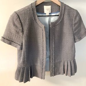 J. Crew grey suit jacket, shirt sleeves with flounce at hip. Tweed material.
